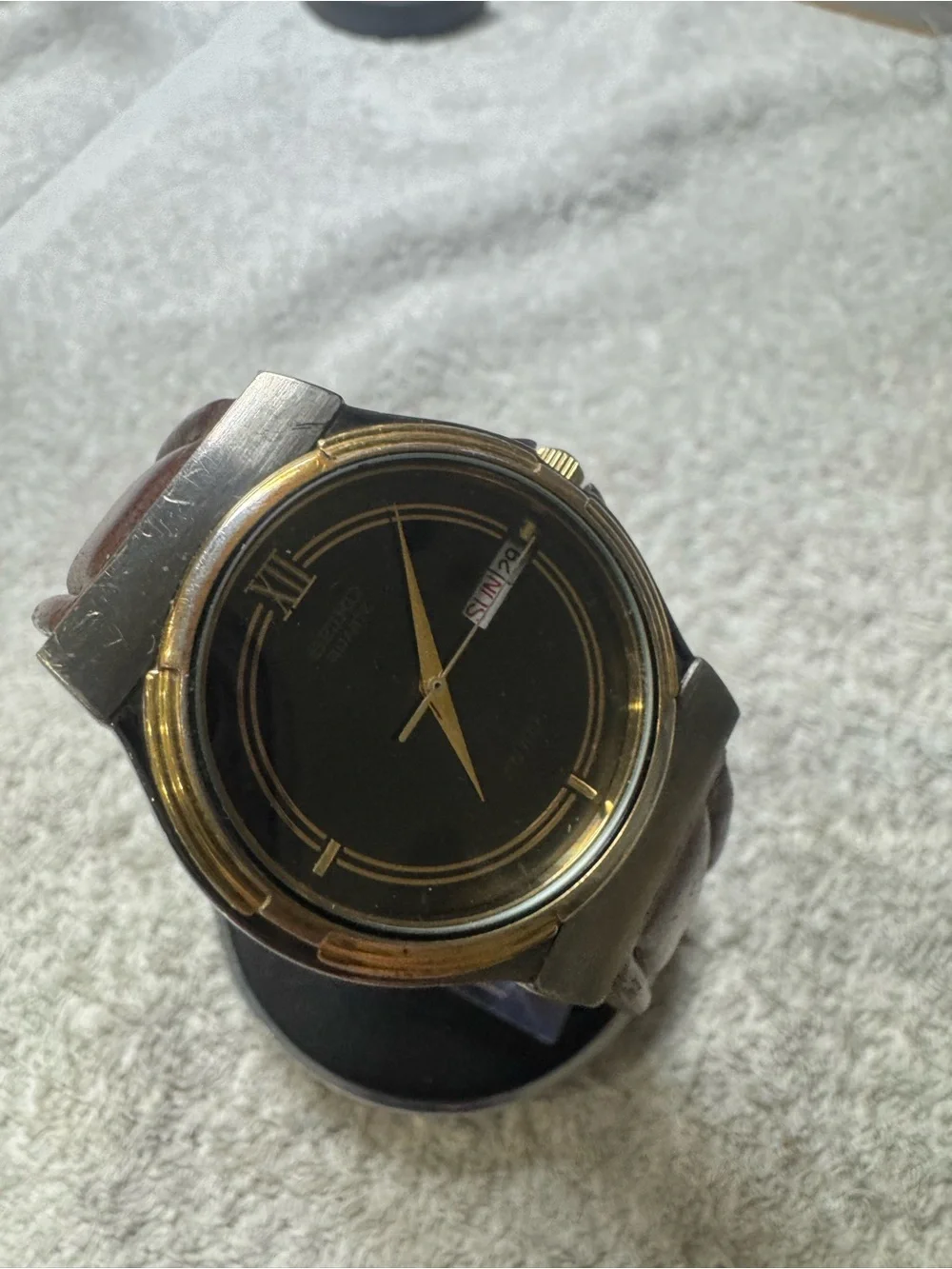 Seiko Black Dial Watch with Gold Accents
